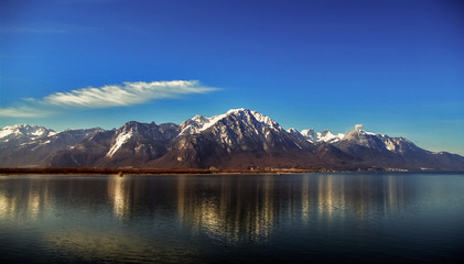 Beautiful Alps in front of Swiss lake Leman, summer time