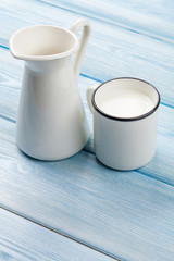 Milk cup and pitcher