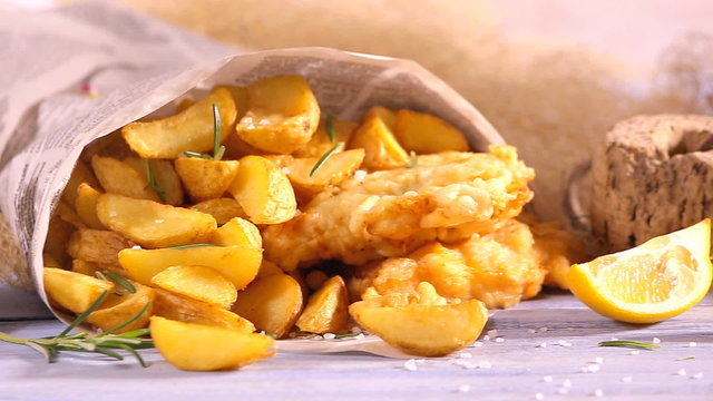 Hot fish and chips with lemon