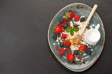 Oatmeal with berries. top view