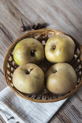 Apples in a rustic bowl
