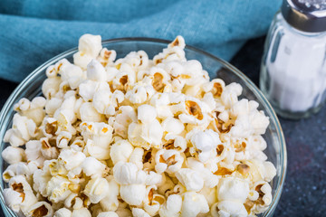 Glass bowl full of popcorn