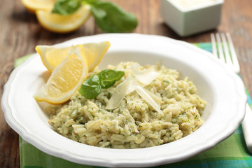Risotto with Parmesan on a rustic table