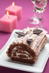 Yule log cake on a Christmas table