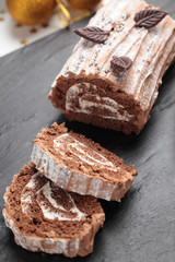 Yule log cake on a Christmas table
