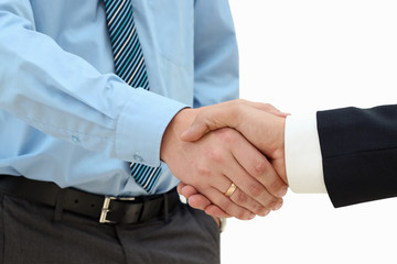 Close-up image of a firm handshake  between two colleagues on a