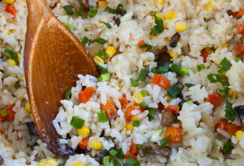 delicious risotto and wooden spoon