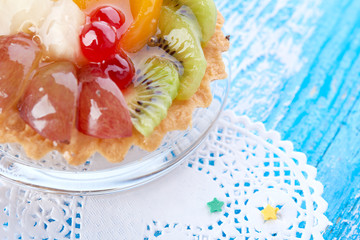 sweet cake with fruits on plate