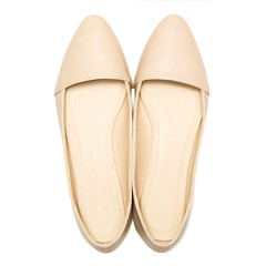 Beige female shoes, isolated on white background. top view