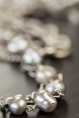 Assorted silver costume jewellery with a jumbled pile