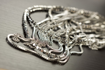 Pile of assorted silver chains 