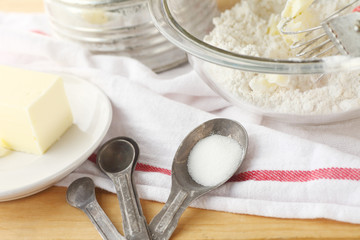 Baking still life with old measuring spoons