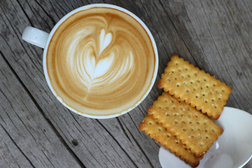 latte coffee in glass and crackers