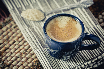 Blue cup of espresso coffee