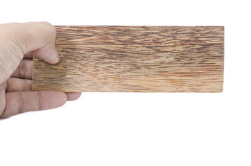 difference angle hand holding dark brown small wooden plate