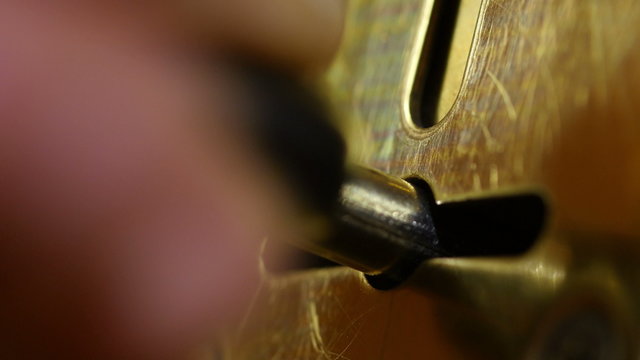 Key sliding  into lock and locking\ unlocking door. 4K UHD. 
