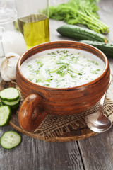 Summer soup with cucumbers, yogurt and fresh herbs