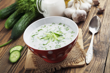 Summer soup with cucumbers, yogurt and fresh herbs