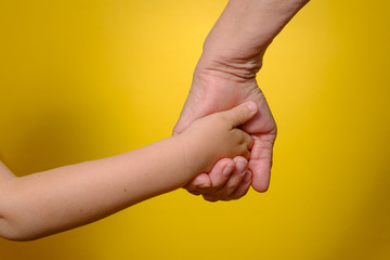 Grandmother and grandson holding hands