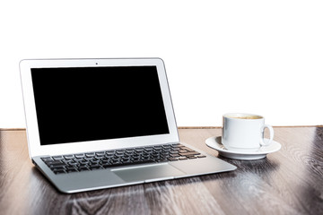 Open laptop on a wooden desk