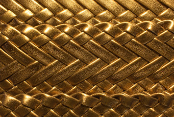 golden  background with textured leather braided