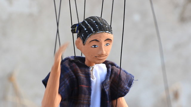 Playing with marionette 
