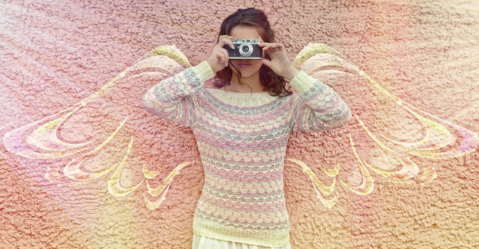 The woman the photographer with wings