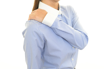 肩こりを訴える女性