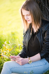 Teenage girl resting in park