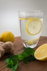 Lemon Ginger Tea on wooden Background