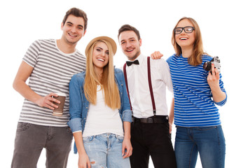 Obraz premium Four stylish young people on white background