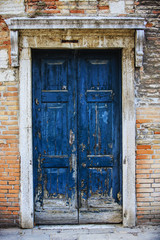 Fototapeta na wymiar Old front door to house, Venice, Italy