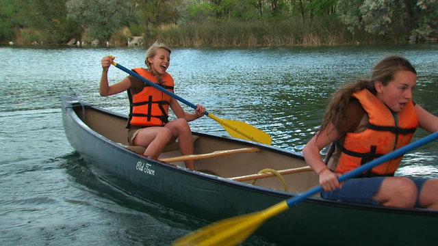 two girls in a canoe