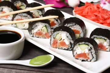 Japanese sushi rolls with salmon and tofu
