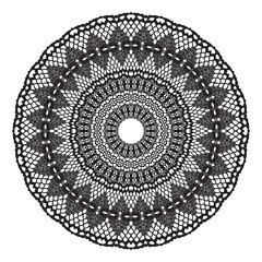 Black crochet doily.