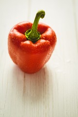 Red pepper with water drops