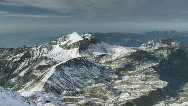 Wide shot/high angle of snow covered mountain / Schilthorn Piz Gloria, Bern, Switzerland