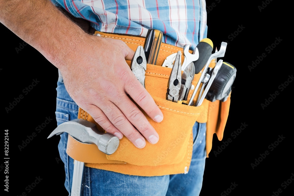 Poster Composite image of midsection of handyman wearing tool belt