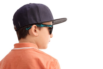Cool little boy with a cap and sunglasses