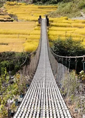 Foto op Plexiglas rope hanging suspension bridge in Nepal © Daniel Prudek