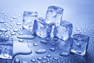 ice cubes on blue background
