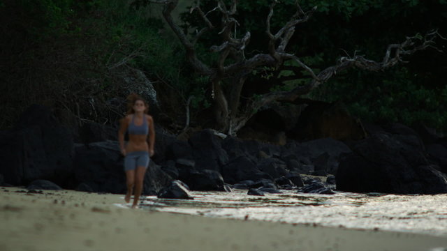 woman running on the beach