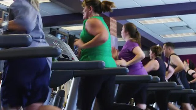 MS DS People exercising on treadmills in gym / Draper, Utah, USA