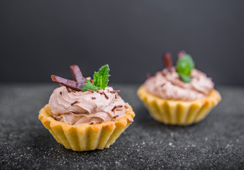 Small biscuits with chocolate and sweet cream