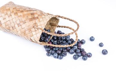 Wicker basket with Blueberries Isolate on white