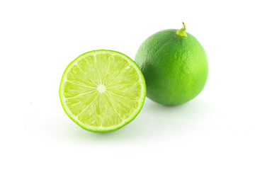 Half of Fresh lime citrus fruit on white background