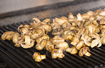 mushrooms grilling in the kitchen at the restaurant