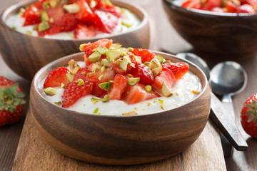 homemade yogurt with fresh strawberries and pistachios