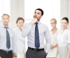 handsome businessman looking up