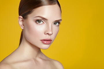 Portrait of beautiful young woman with clean face.